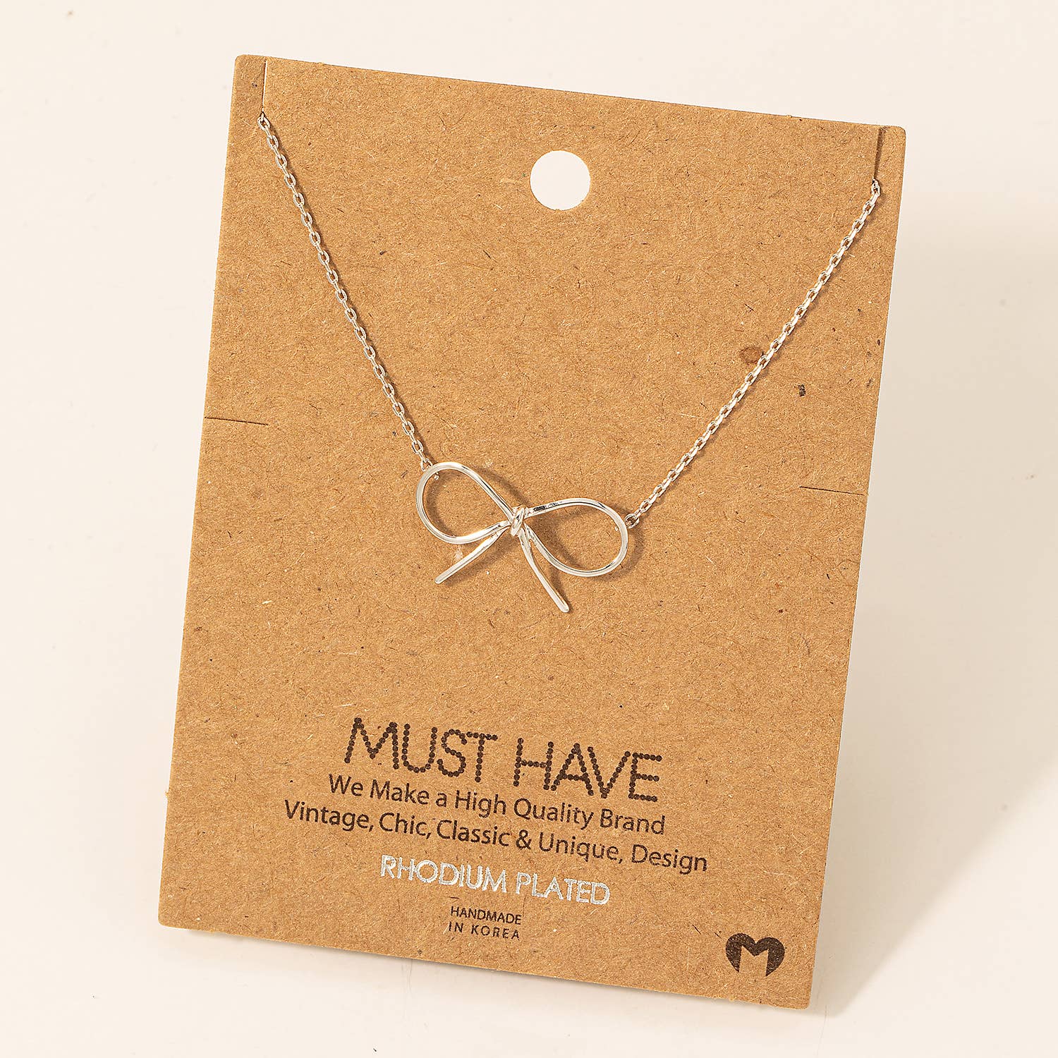 Gold Dipped Bow Tie Pendant Necklace