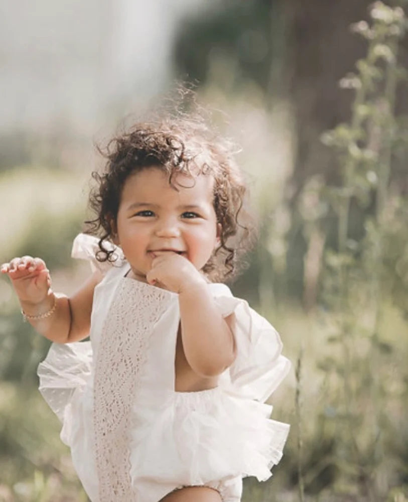 Ruffle flutter ivory tulle romper