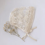 Lace baby bonnet (one size)